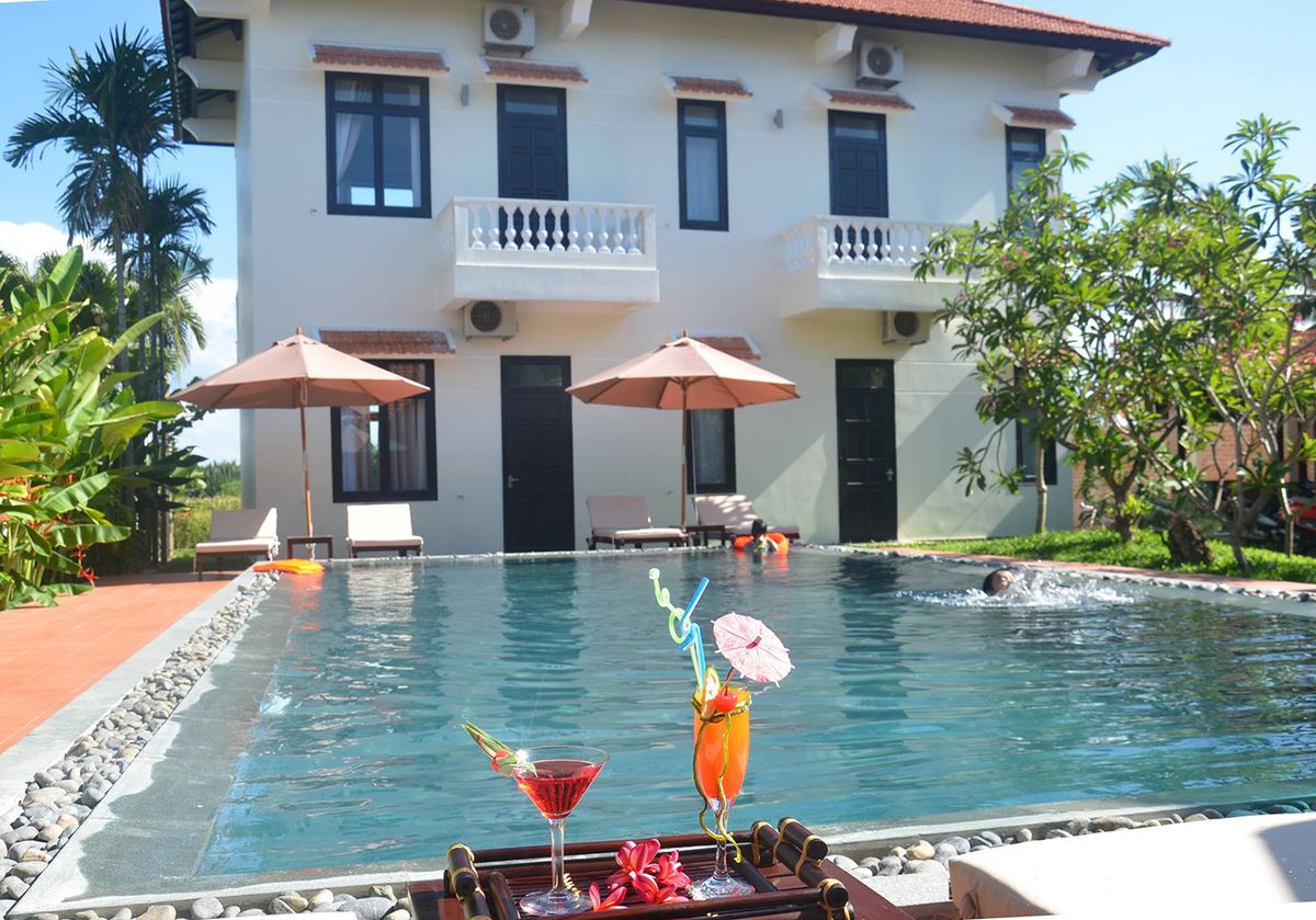 Trải nghiệm dịch vụ nghỉ dưỡng giá rẻ tiện nghi tại Hoi An Red Frangipani Villa 8