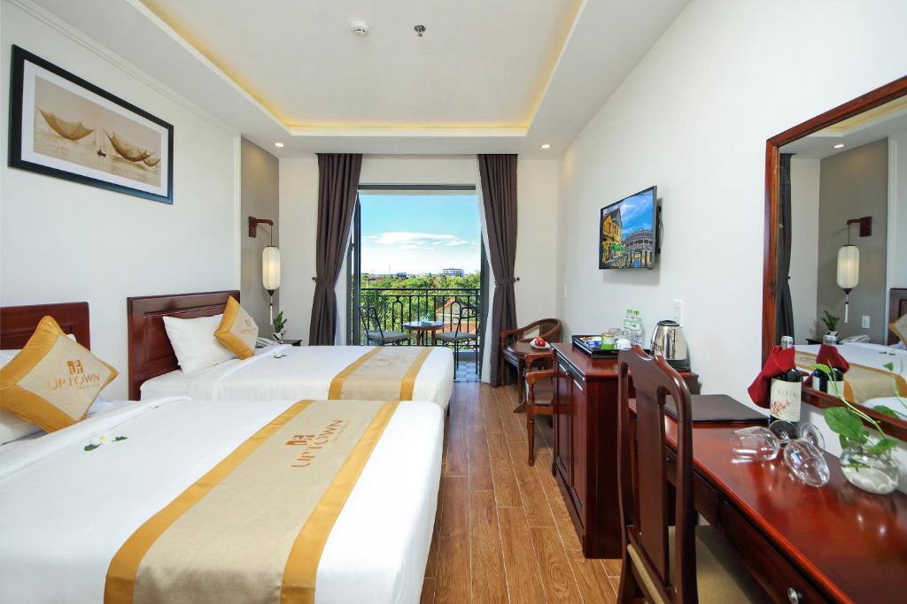 Uptown Hoi An Hotel - Sở hữu hồ bơi tuyệt đẹp trên sân thượng khiến bạn phải choáng ngợp 8