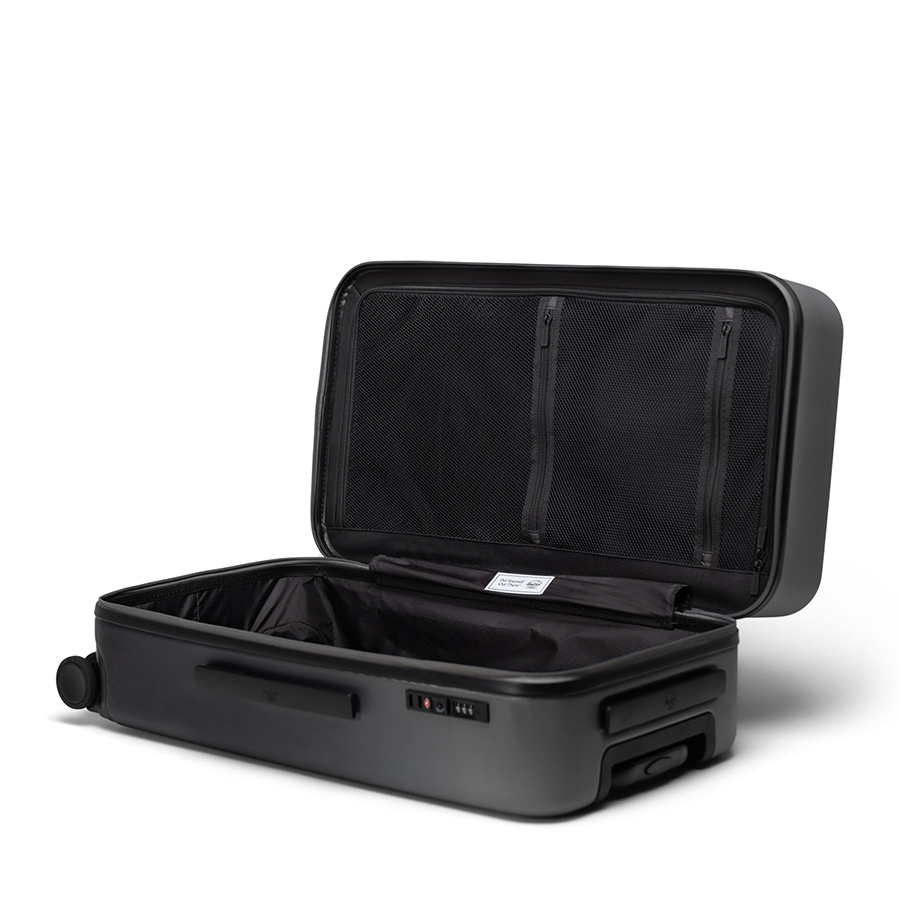 Vali kéo nhựa cứng Herschel Heritage TM Hardshell Medium Luggage_26 L Black Gradient