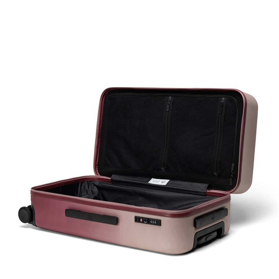 Vali kéo nhựa cứng Herschel Heritage TM Hardshell Medium Luggage_26 L Oxblood Red Gradient