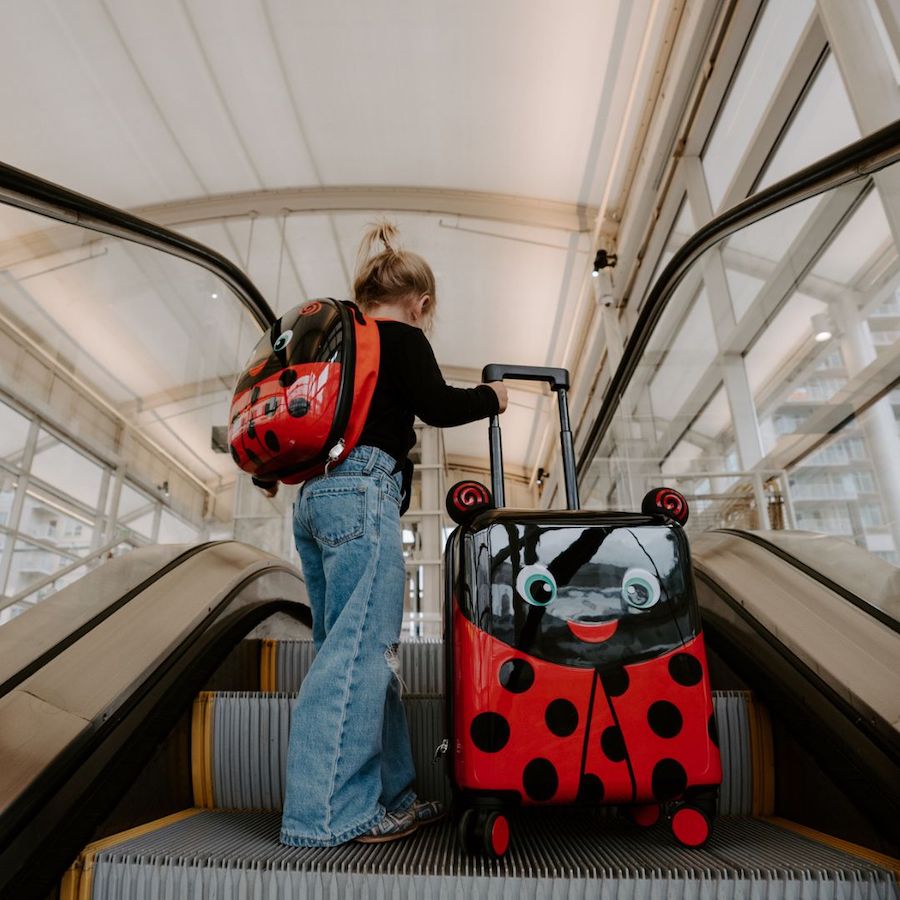 Vali kéo trẻ em Heys Vali Super Tots Spinner M Lady Bug Red